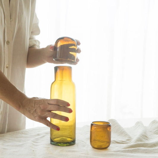 Botella con tapa de vidrio soplado