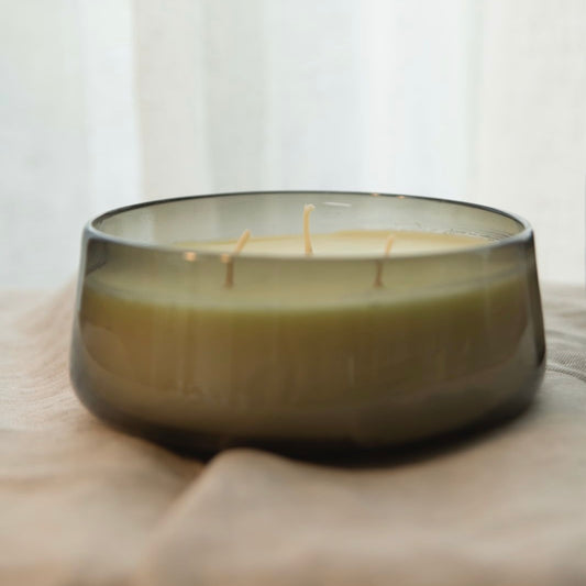 Vela de soya en cuenco de vidrio soplado verde